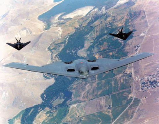 A B-2 in formation with a pair of F-117s