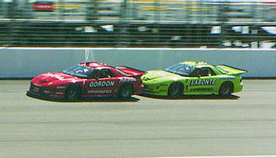Pair of stock cars illustrating the drafting concept