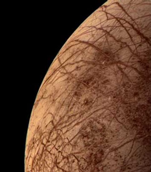 View of Europa showing cracks along its icy surface