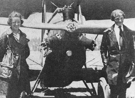 Neta Snook and Amelia Earhart beside Earhart's Kinner Airster biplane