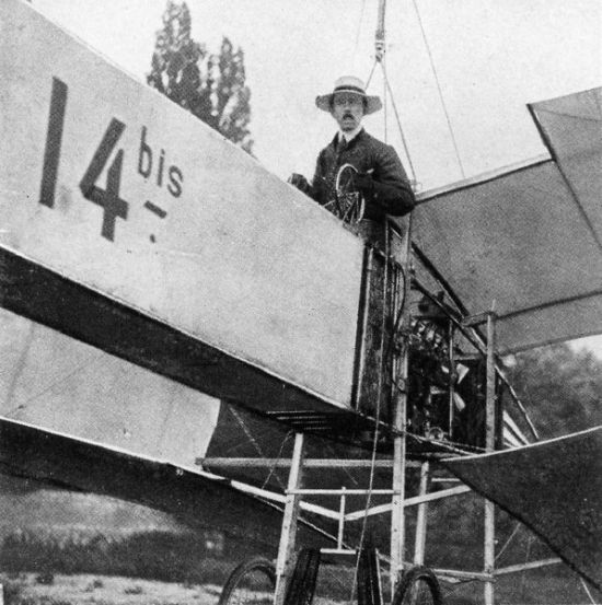 Santos-Dumont standing in the cockpit of the 14-bis