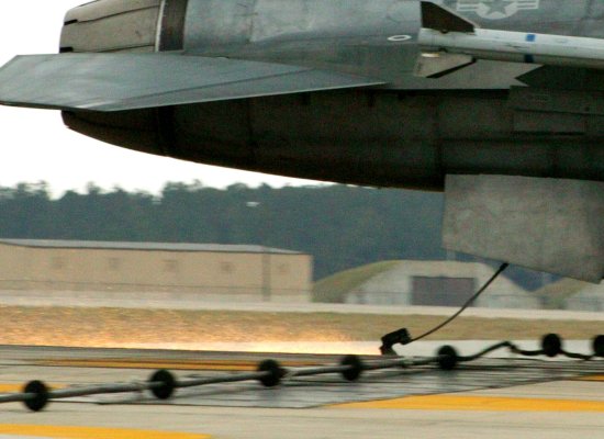 F-16 tailhook about to snare the cable of a crash barrier