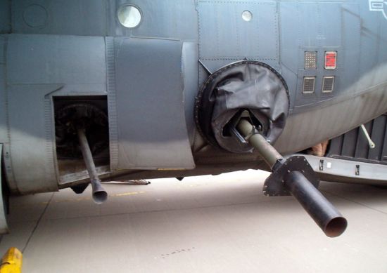 Aft fuselage of an AC-130 containing a 40-mm cannon (left) and a 105-mm Howitzer (right)