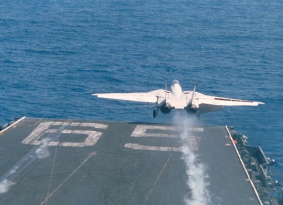 F-14 with wings fully extended during takeoff