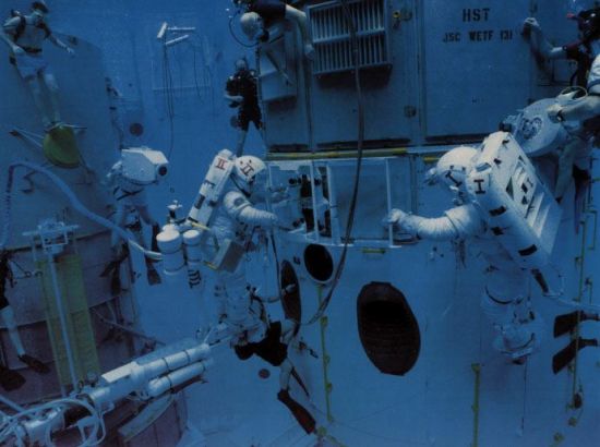 Astronauts training in a water tank