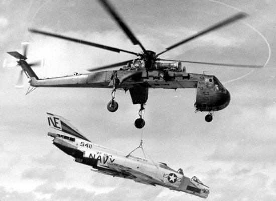 CH-54 Tarhe recovering a damaged F-4 Phantom II