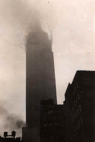 Smoke rising from the Empire State Building after the impact