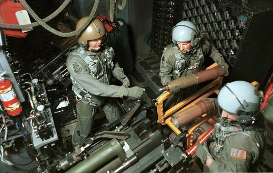 Crew operating the 105-mm Howitzer aboard an AC-130