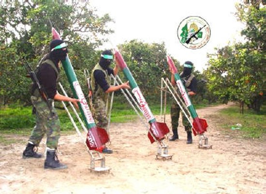 Hamas militants preparing to launch deceptively festive looking Qassam rockets